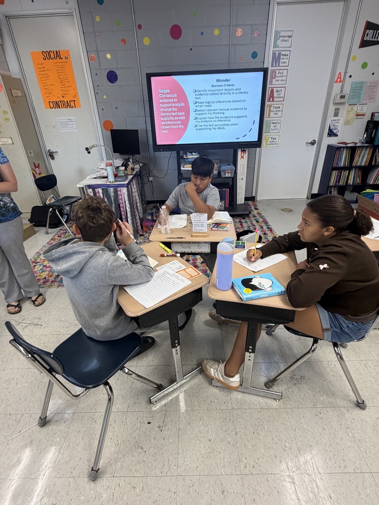 Students collaborate on Wonder, sharing ideas and supporting their thinking with textual evidence.