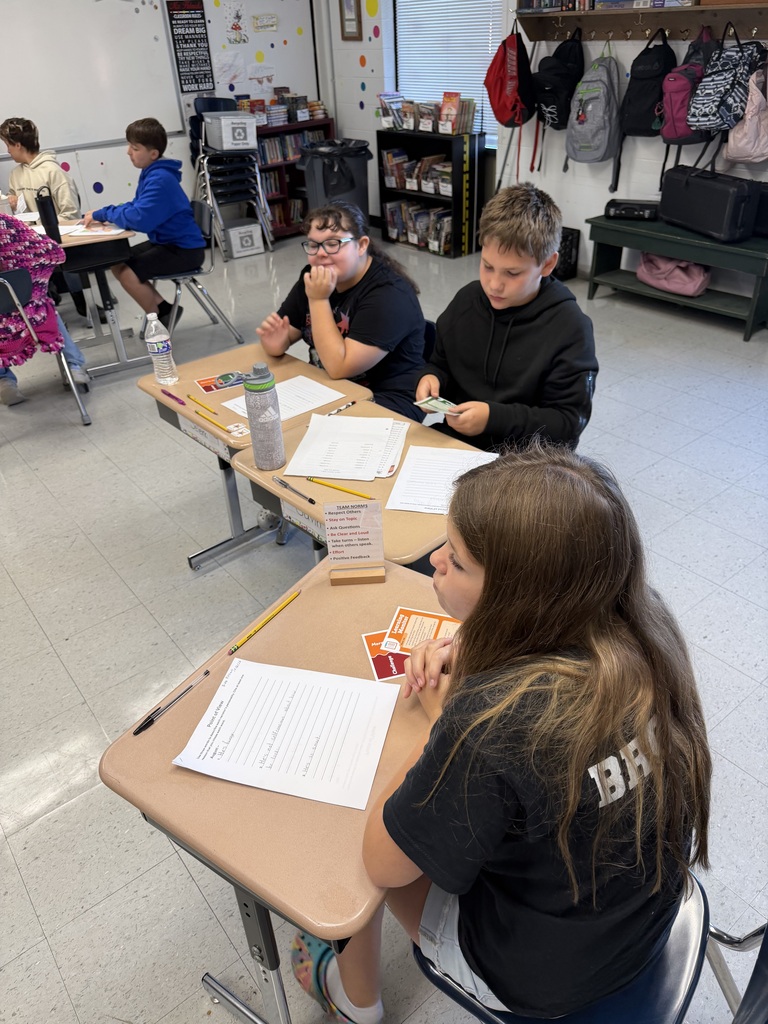 Students collaborate on Wonder, sharing ideas and supporting their thinking with textual evidence.