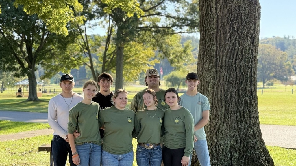 members pose for a photo