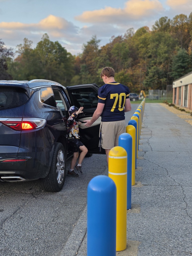 These are pictures of high school students opening car doors and greeting students.