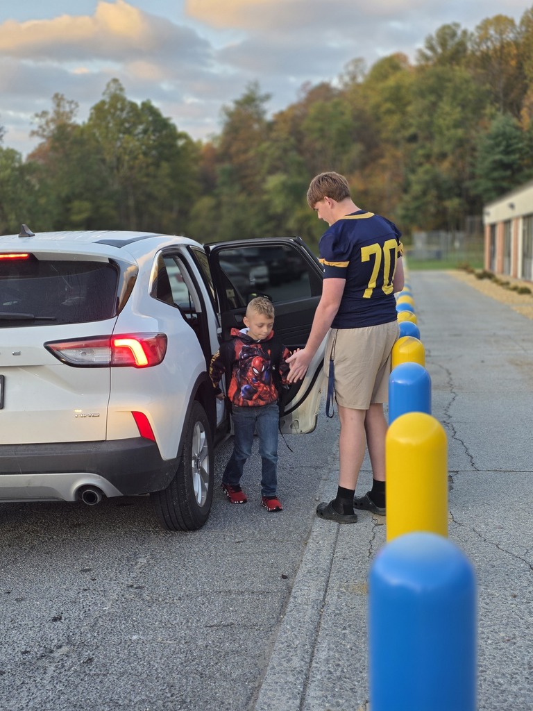 These are pictures of high school students opening car doors and greeting students.
