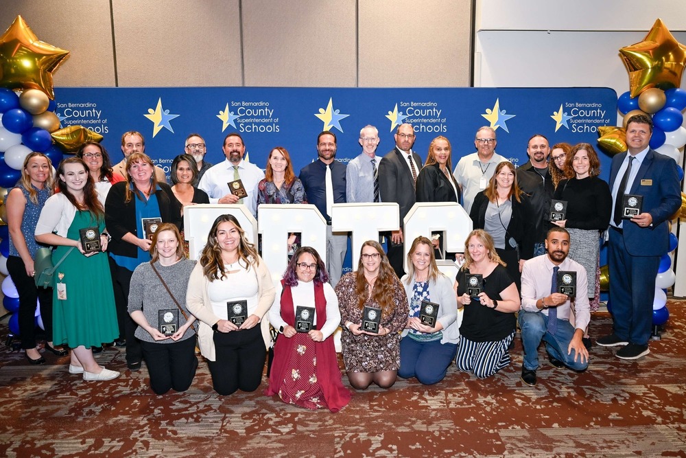 photo of administrators recieving pbis awards