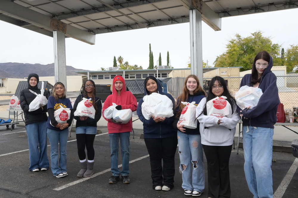Interact Club distributes 300 Thanksgiving Meals