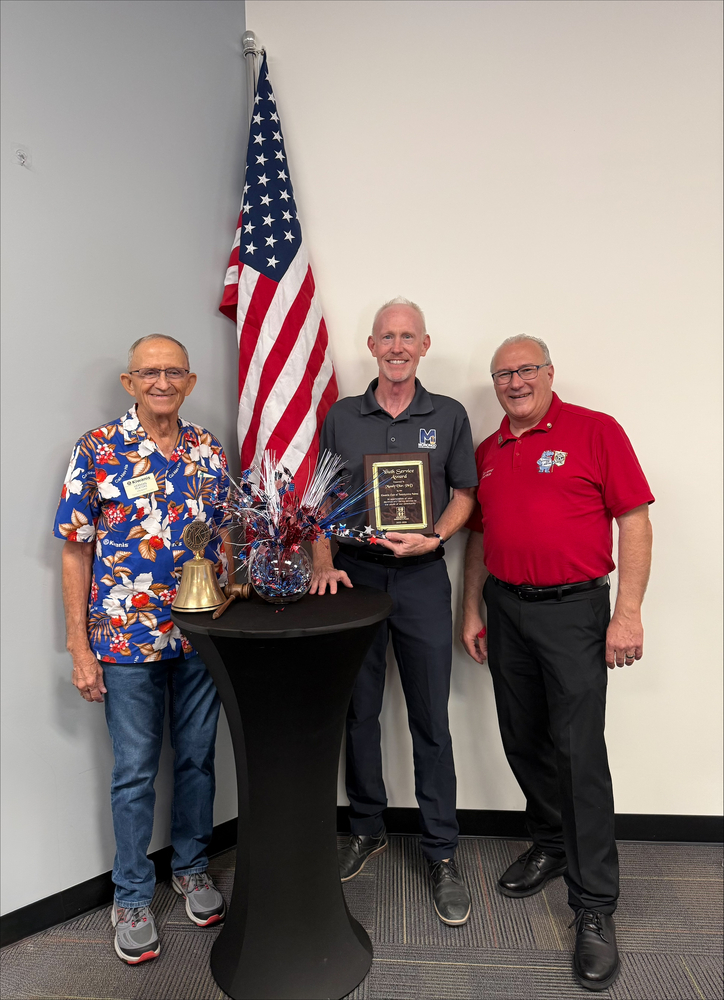 Photo of Dr. Viar with kiwanis award