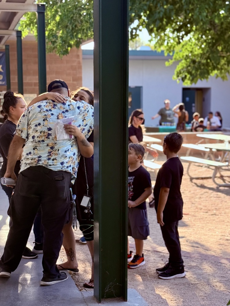 parents greeting eachother at back to school night