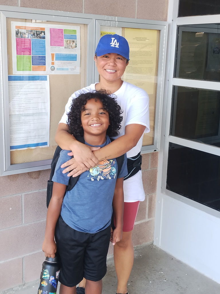 mom and son smiling