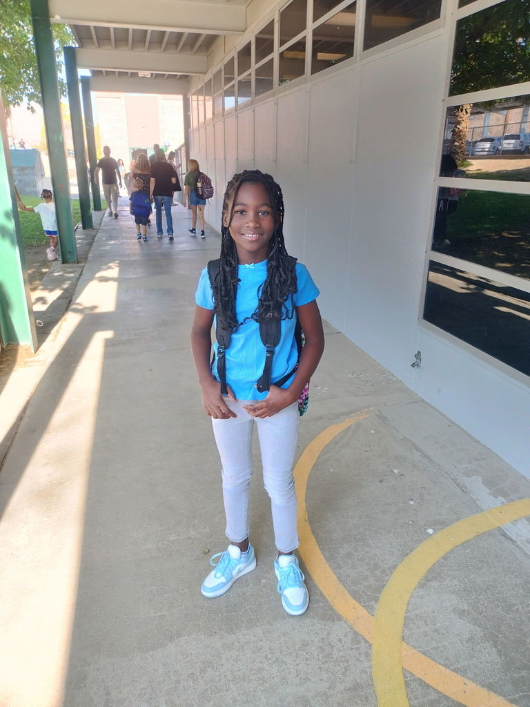 student ready for her first day of fourth grade