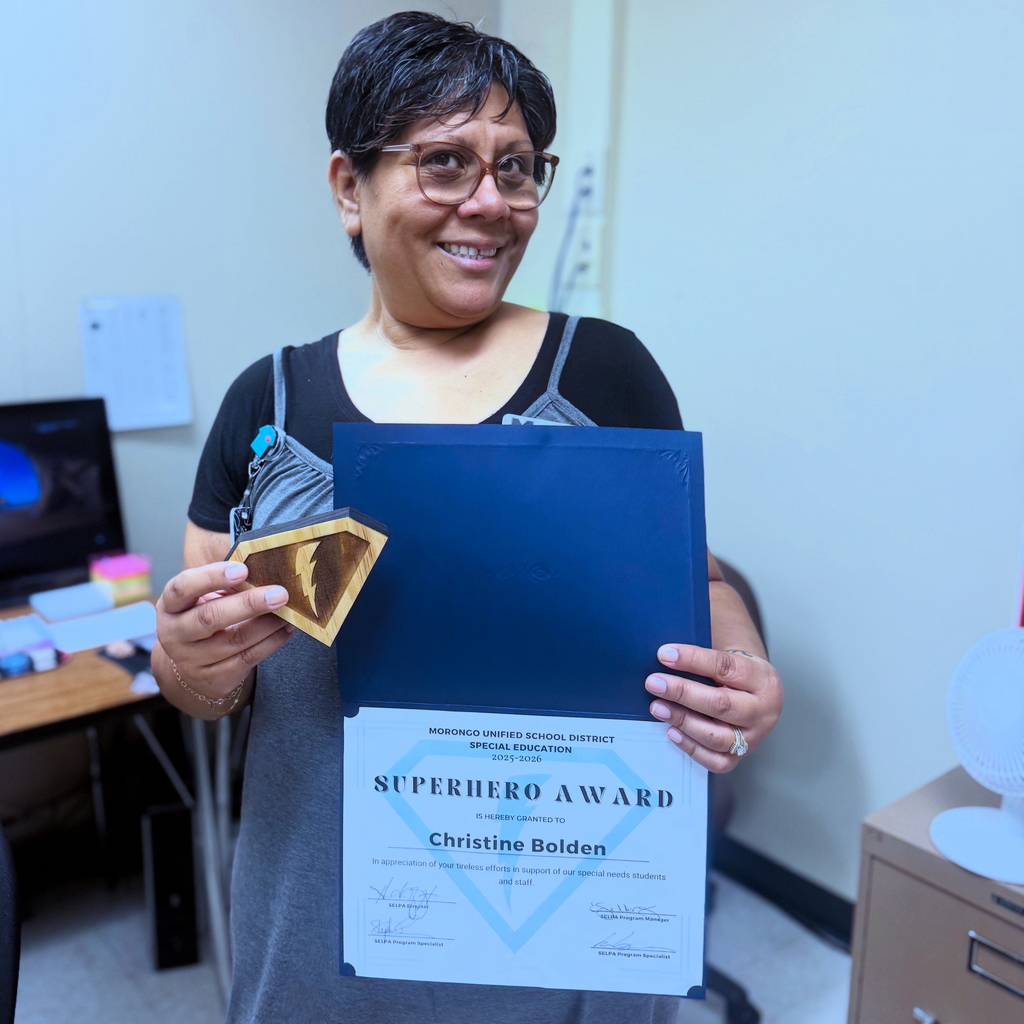 Palm Vista school nurse receiving HERO award.