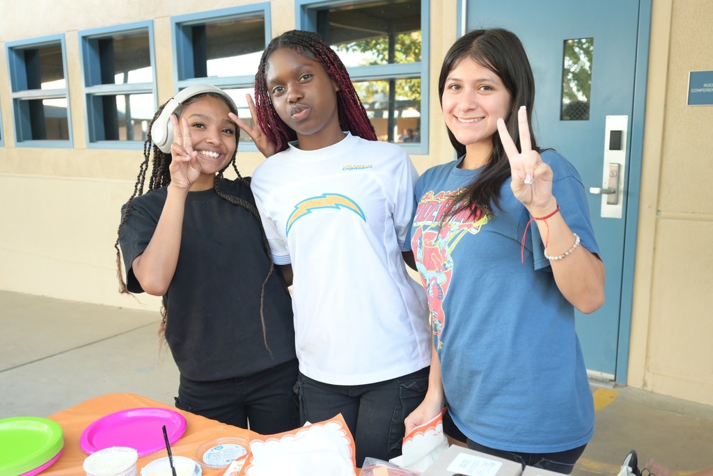 stuent volunteers at fall fest booth