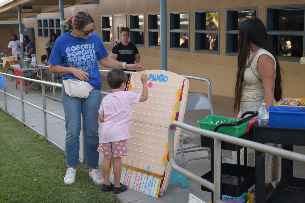 student playing fall fest game
