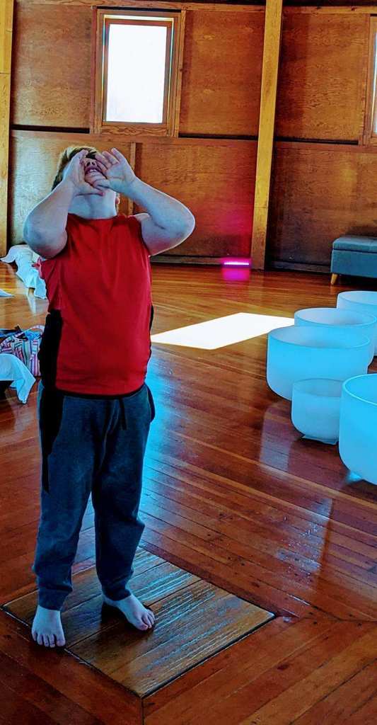 Students at PLUS participate in a sound bath