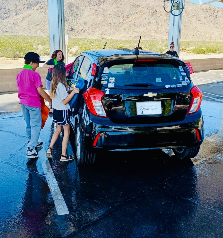 Student Leaders washing car