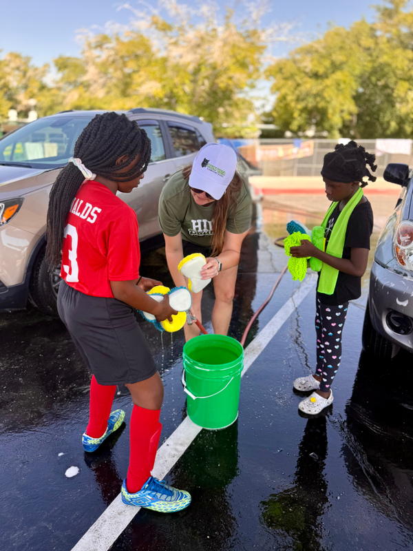 Ms. St. Martin working with student leaders