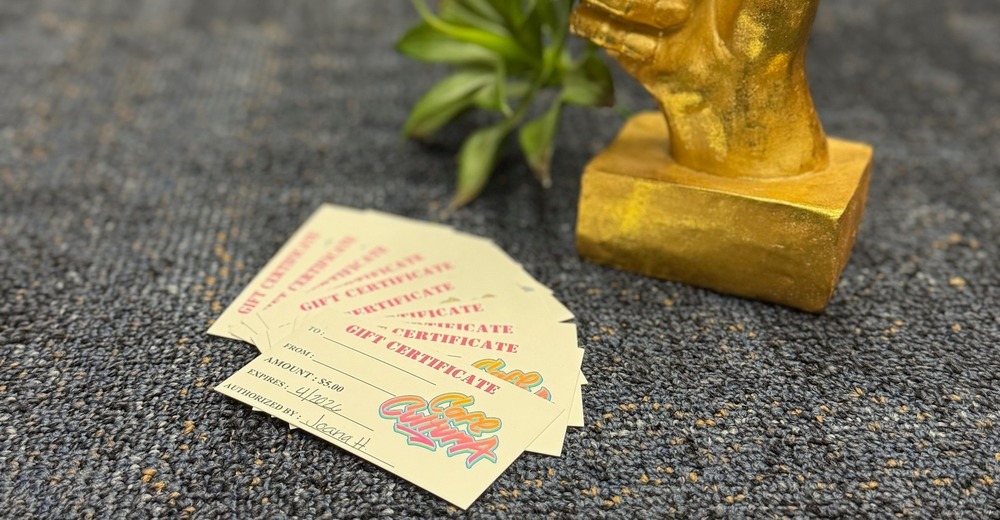 gold thumbs up next to coffee cards
