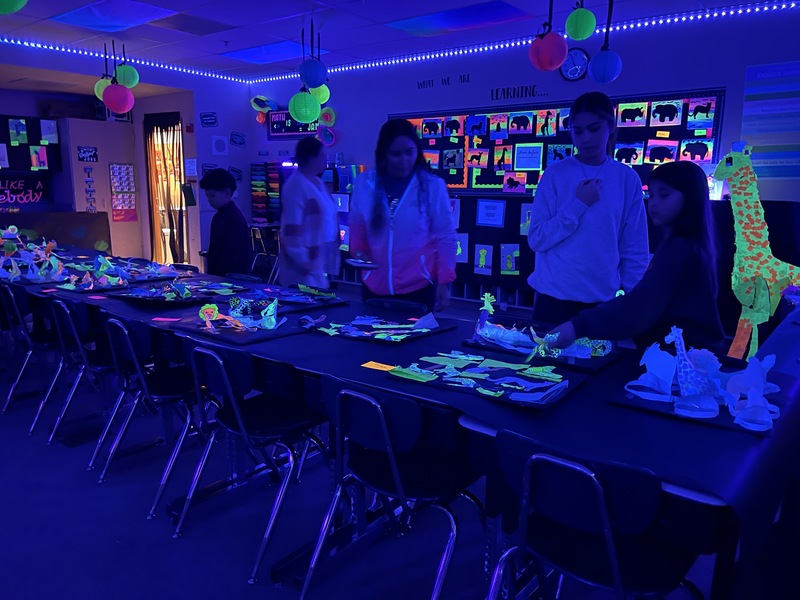 Backlit classroom and neon paint projects