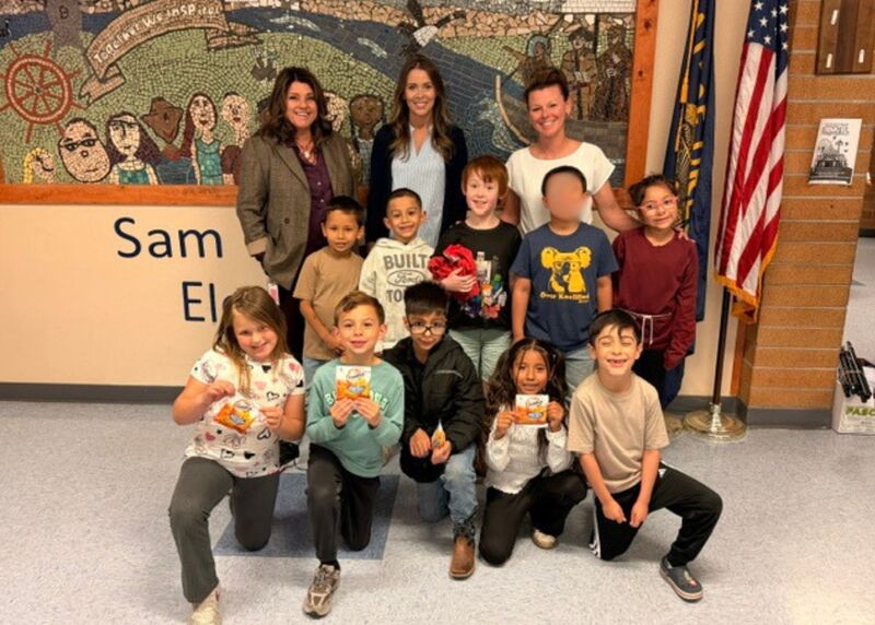 kids holding goldfish snacks