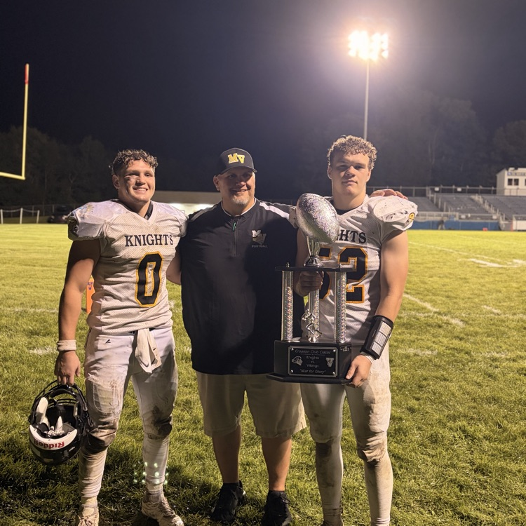 From left to right! starting running back, Rocco reifer. defensive coordinator, Dave Minarchk, starting linebacker Gavin Lovell