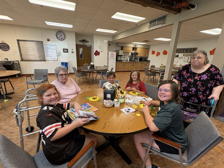 Third Graders did a Sunflower Art with the senior residents at the Mott Care Center. 🌻