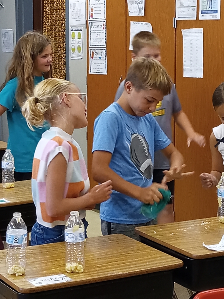The 5th graders are trying to determine if bananas release gas. 