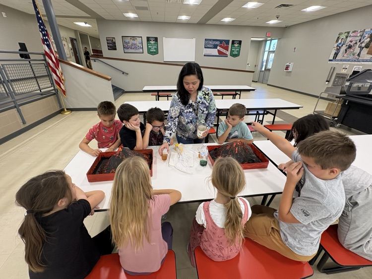 Mrs. Sison’s third-grade class created paper mache volcano art pieces and used them in a volcanic eruption experiment.
