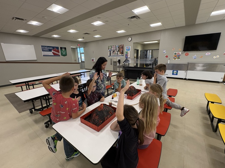 Mrs. Sison’s third-grade class created paper mache volcano art pieces and used them in a volcanic eruption experiment.
