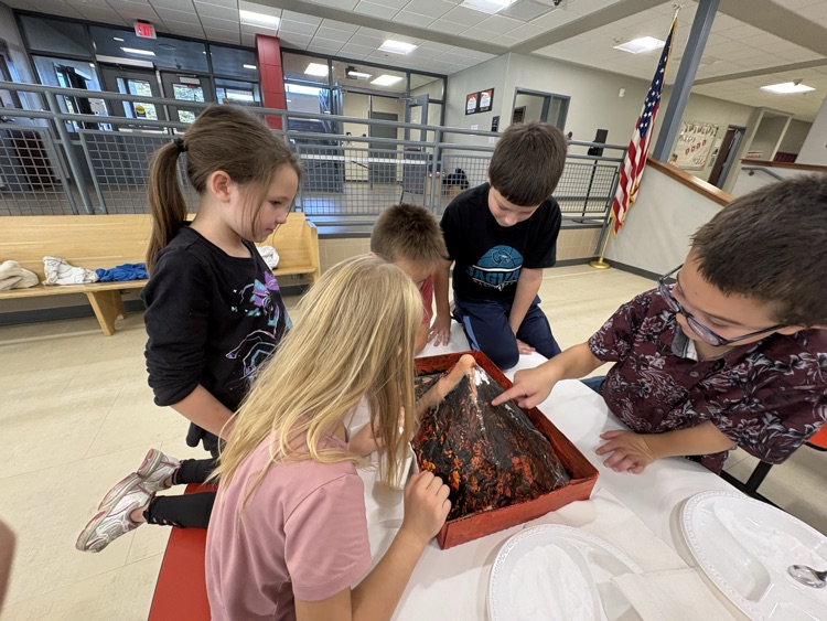 Mrs. Sison’s third-grade class created paper mache volcano art pieces and used them in a volcanic eruption experiment.