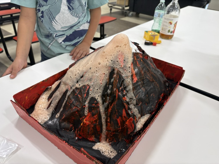 Mrs. Sison’s third-grade class created paper mache volcano art pieces and used them in a volcanic eruption experiment.