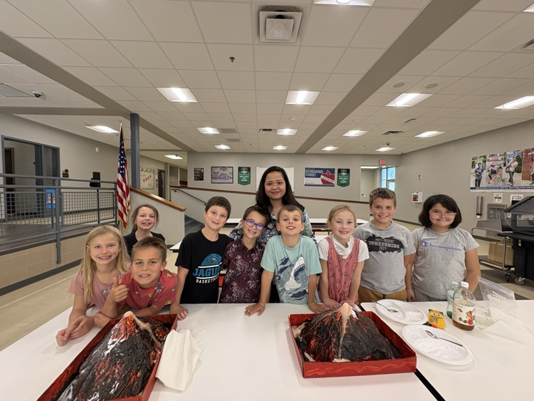 Mrs. Sison’s third-grade class created paper mache volcano art pieces and used them in a volcanic eruption experiment.