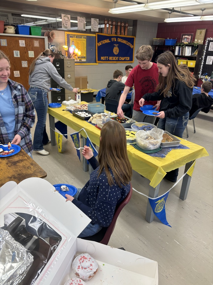 students enjoying goodies 