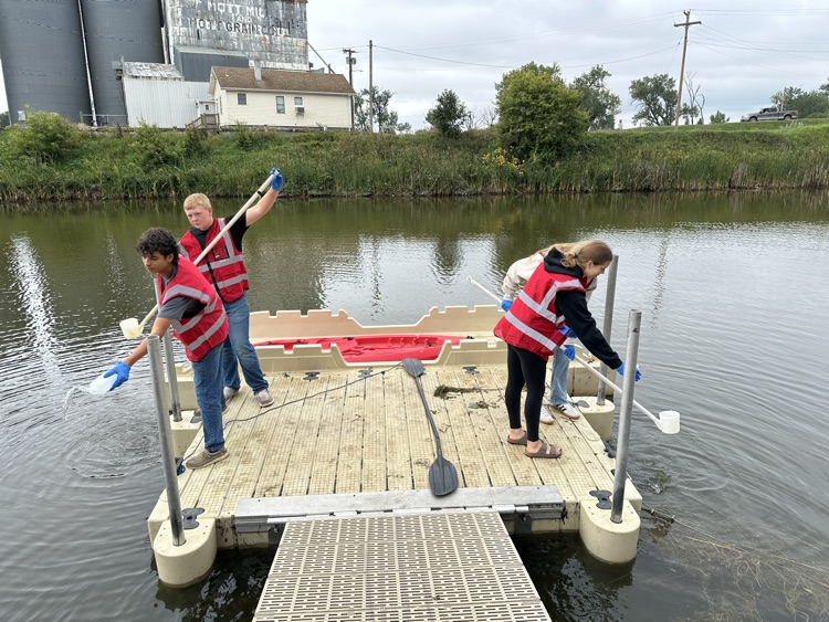 Collecting water sampling from Site 02
