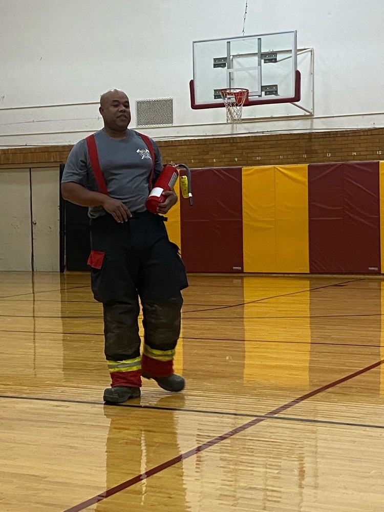 Jimmy talking about fire extinguishers