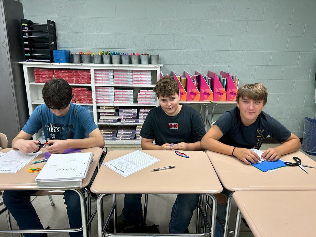 Students working on creating their topographic map models.