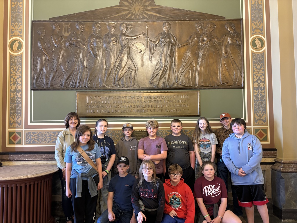 6th grade, Nellie Walker relief statue in the background.