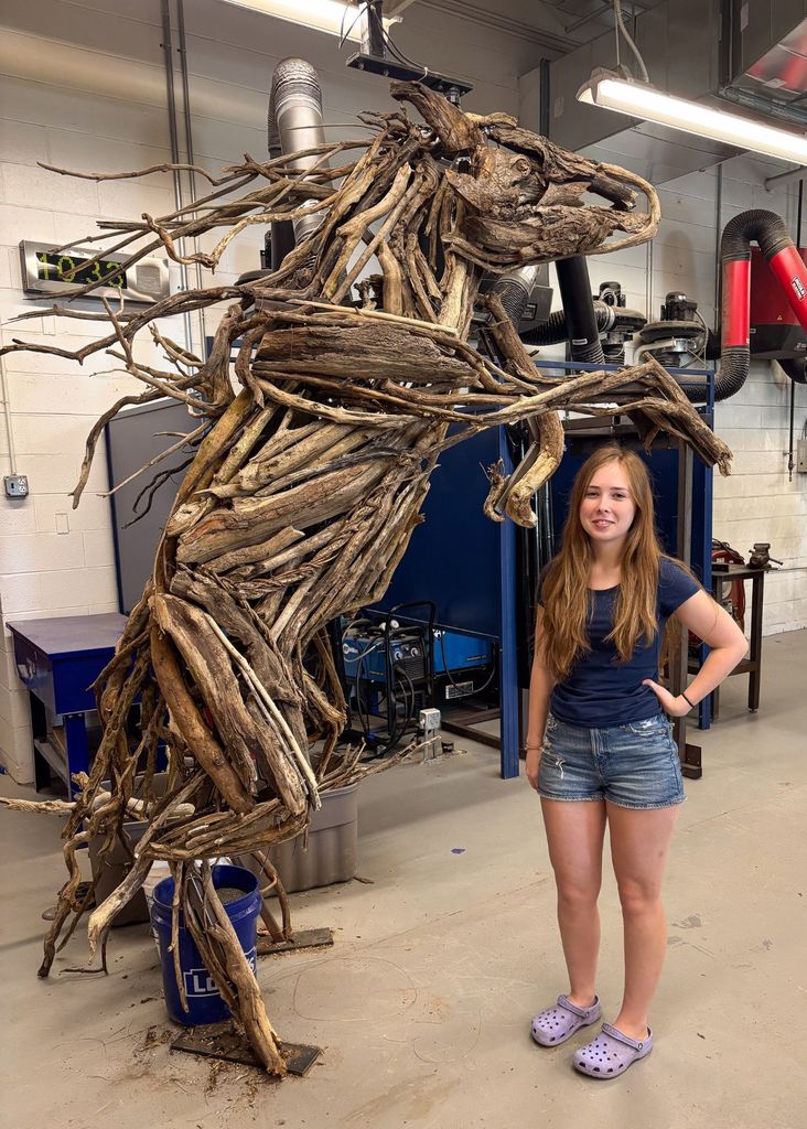 Emily Hartman creates Mustang Statue
