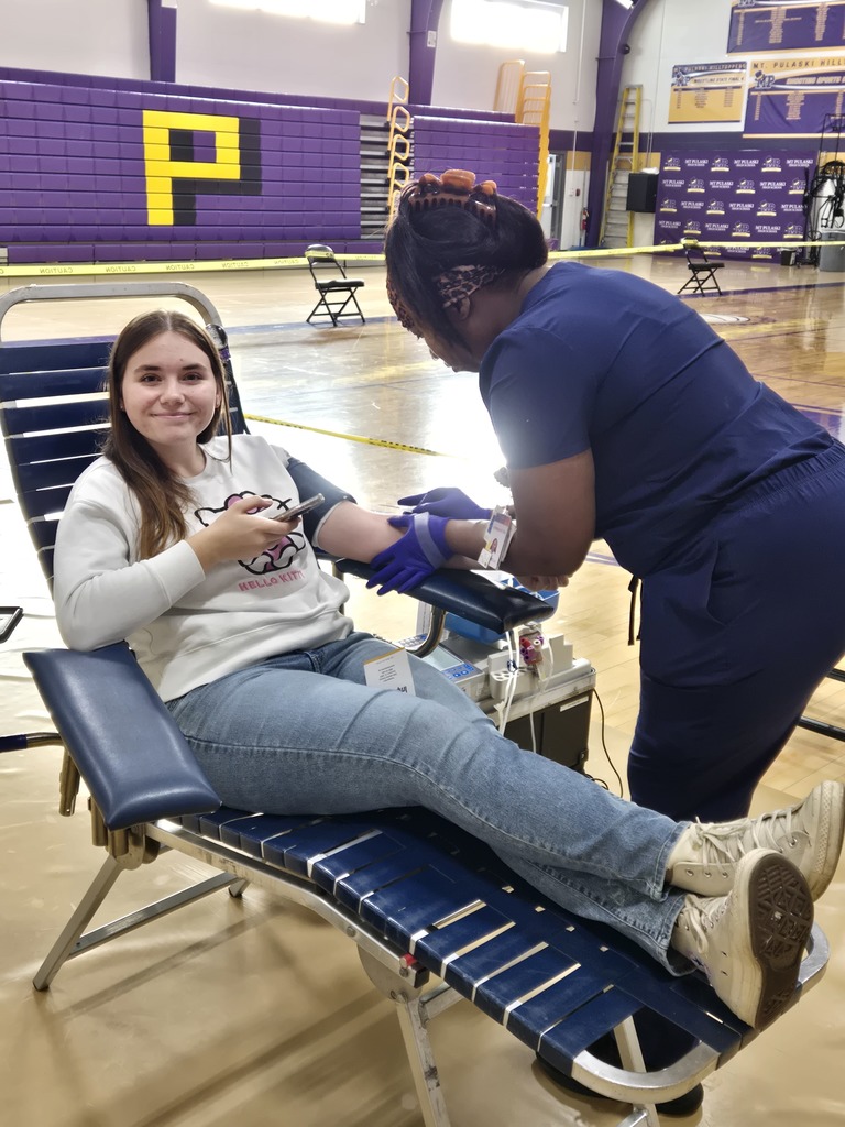 Student preparing to donate