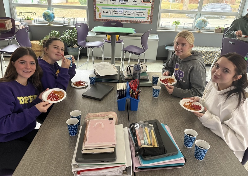 Four girls enjoying snack
