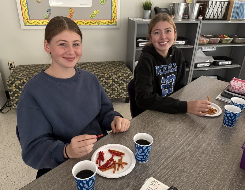 Two girls having snack