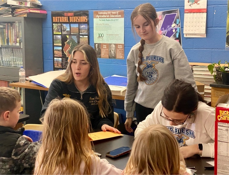 Bella, Cora Lynn, and Mallory teaching.
