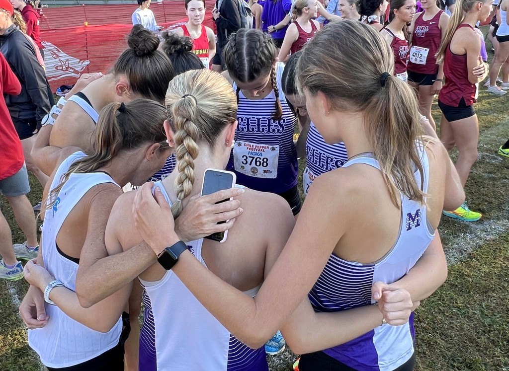 cross country team praying