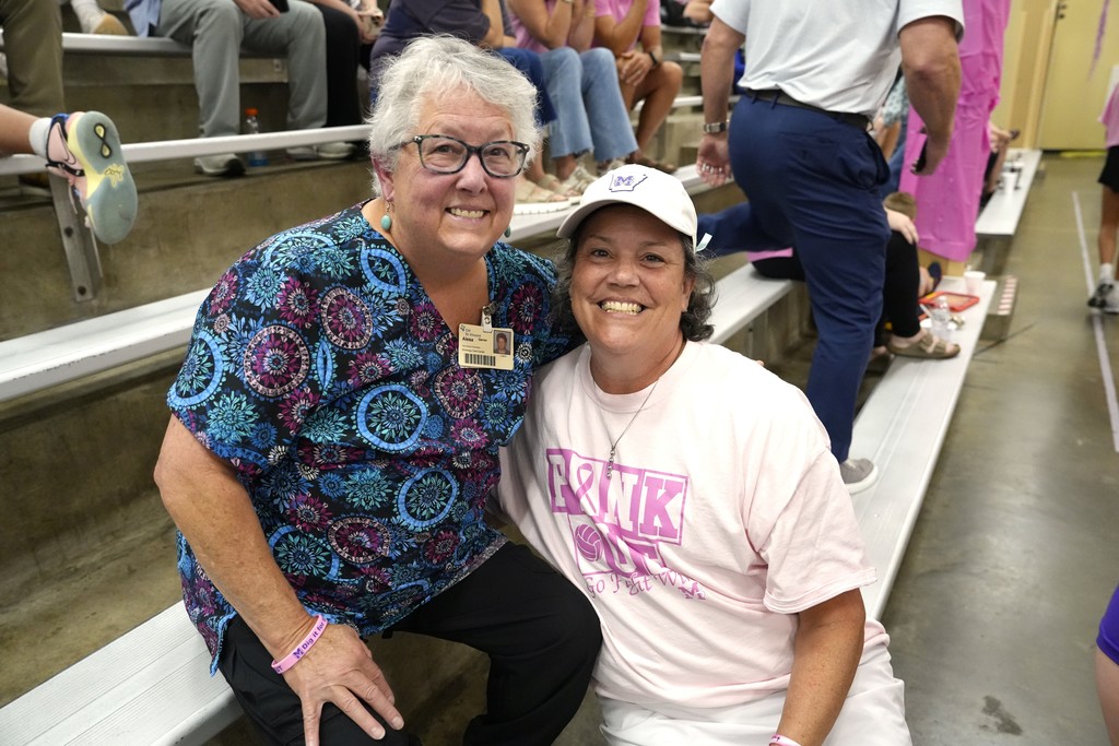Pink out volleyball game and fans