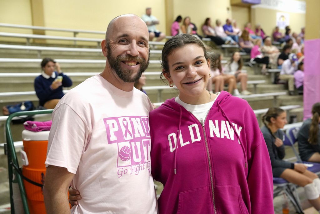 Pink out volleyball game and fans