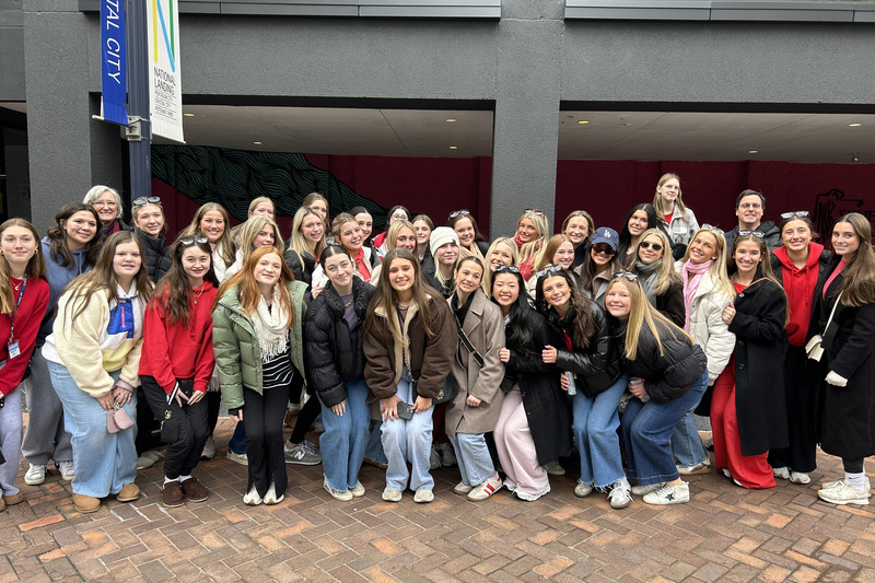 large group of students standing outside