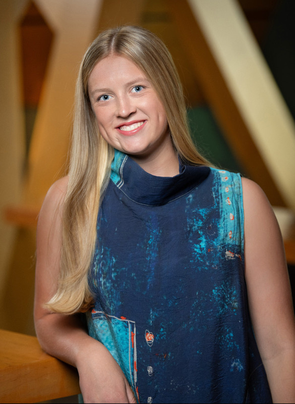 image of young women in blue dress