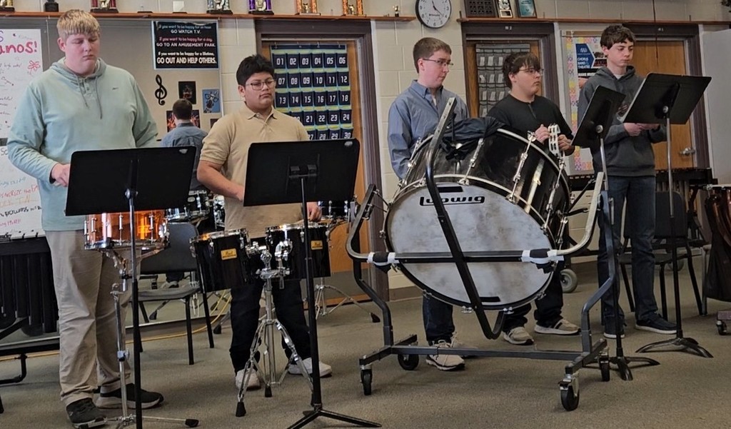 Logan Strand, Isaias Arias, Max Bork, Michael Laufman, and Jaxson Tollefson performing their Percussion Ensemble piece at High School Instrumental Contest