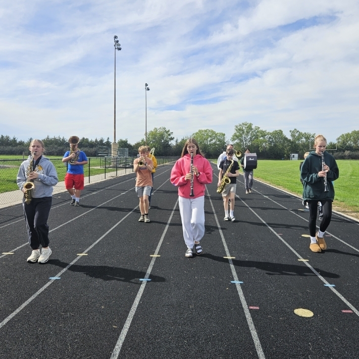 High School Band members practicing for their upcoming marching band competitions. 