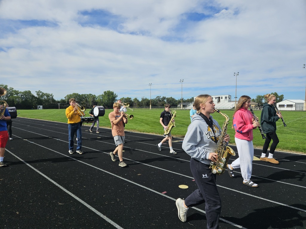 High School Band members practicing for their upcoming marching band competitions. 