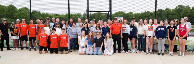 Past and present players, coaches, families and friends celebrate Coach Knox's honor.