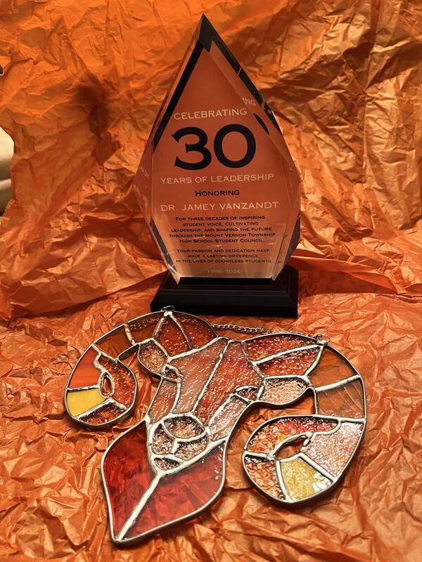 A lovely trophy and gift to acknowledge Dr. Van Zandt's 30 years of service