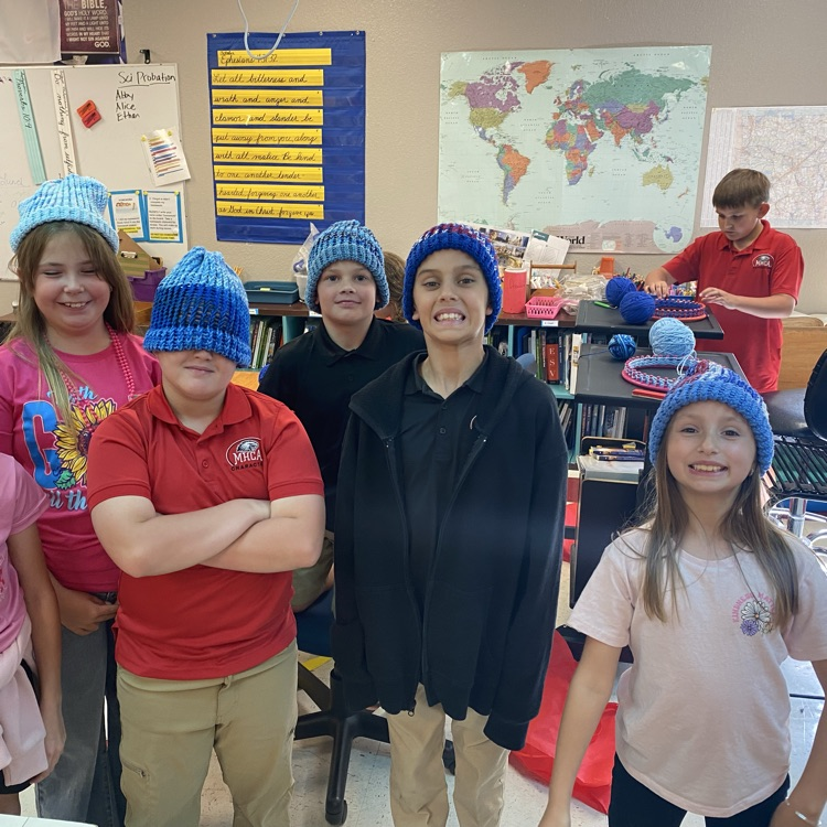 Fifth grade recently learned how to hoop knit hats!