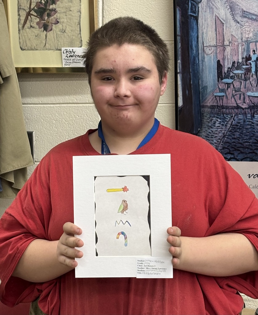 kid holding artwork